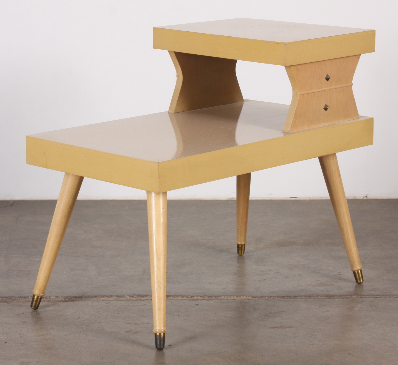 Pair of 1950's Mid Century Modern two tiered end tables EBTH