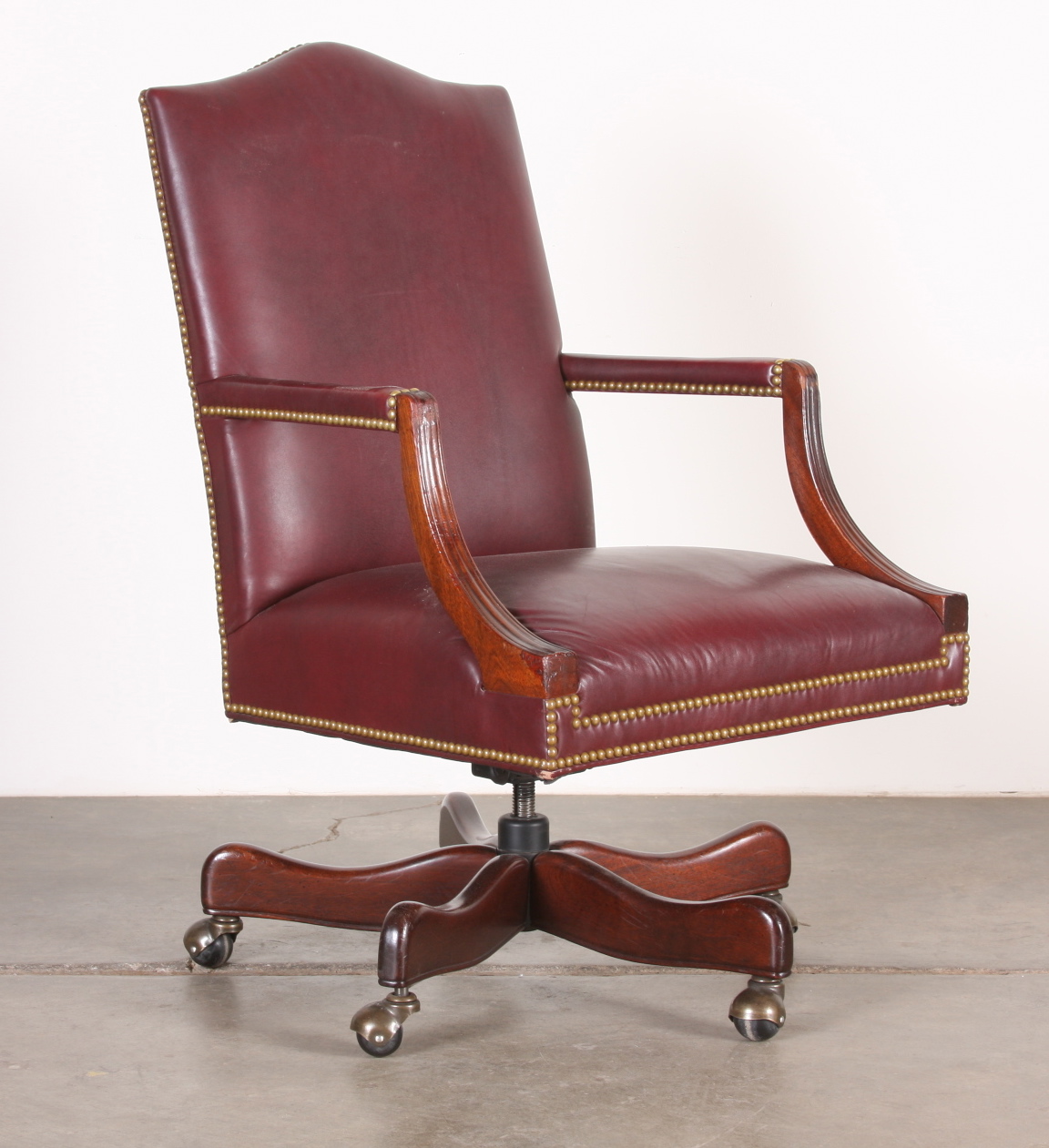 Two Red Leather Rolling Arm Chairs EBTH