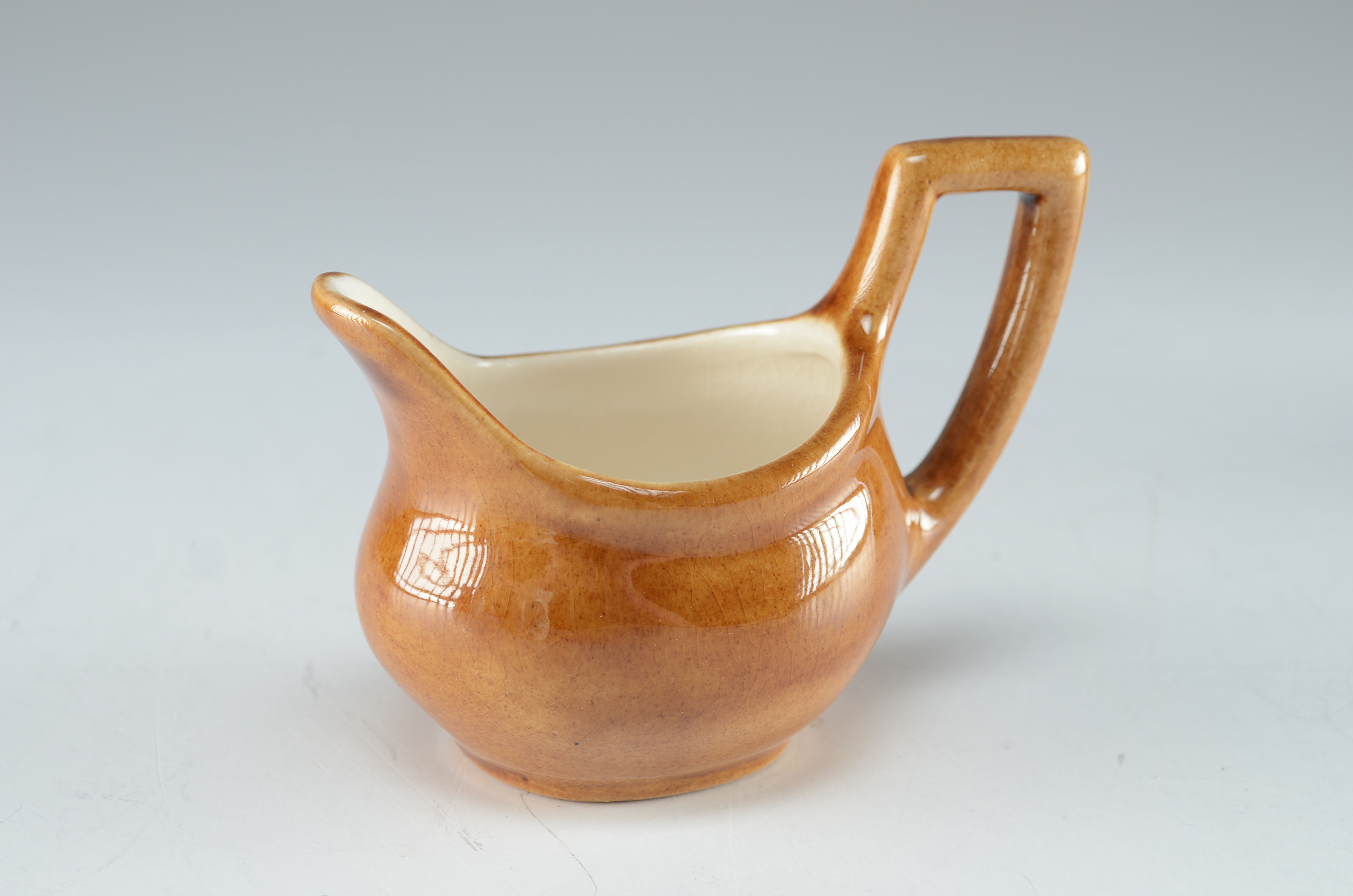 Grouping of Small Decorative Pottery Pitchers EBTH