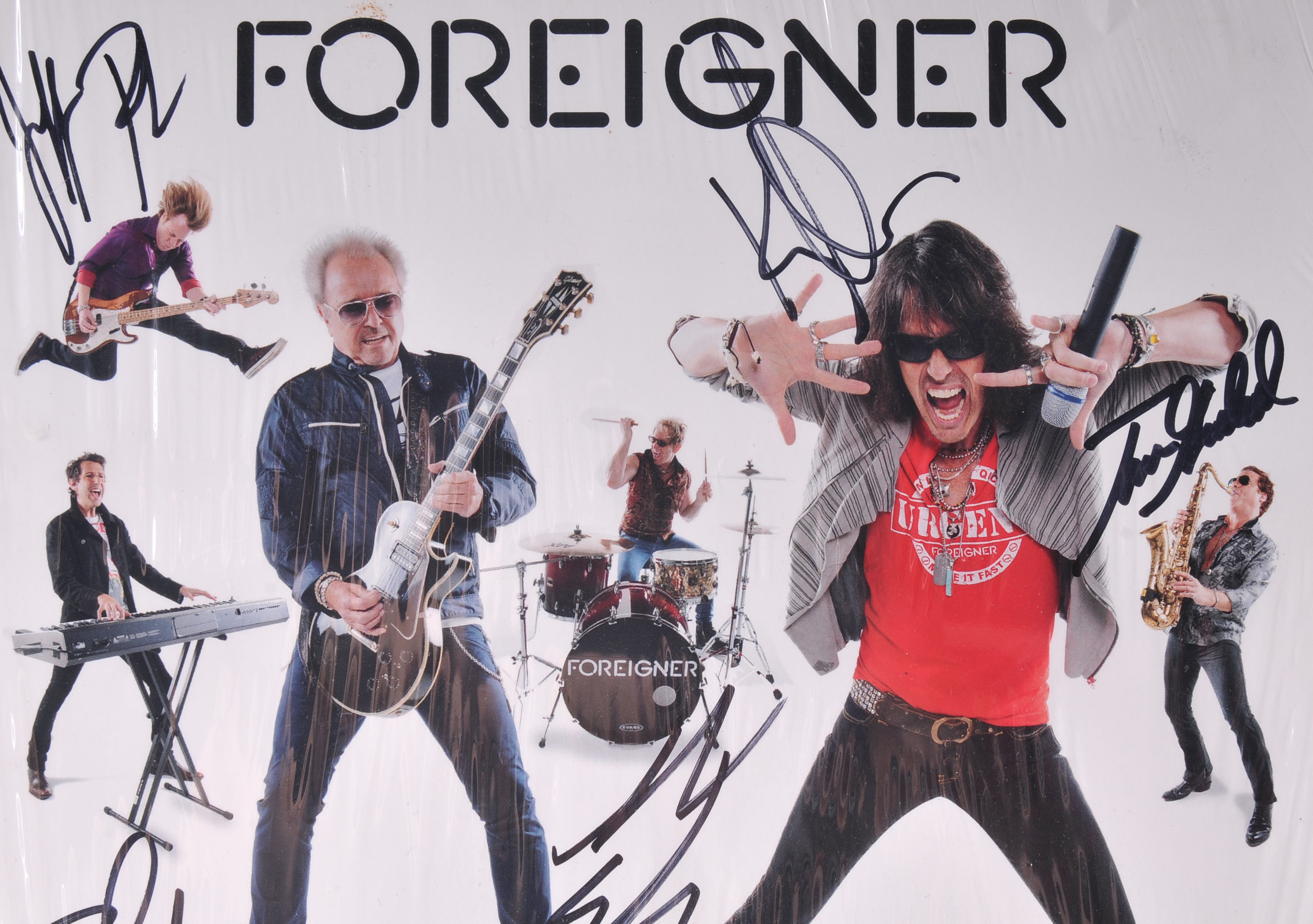 Vintage Signed Foreigner Mini Poster with Signatures EBTH