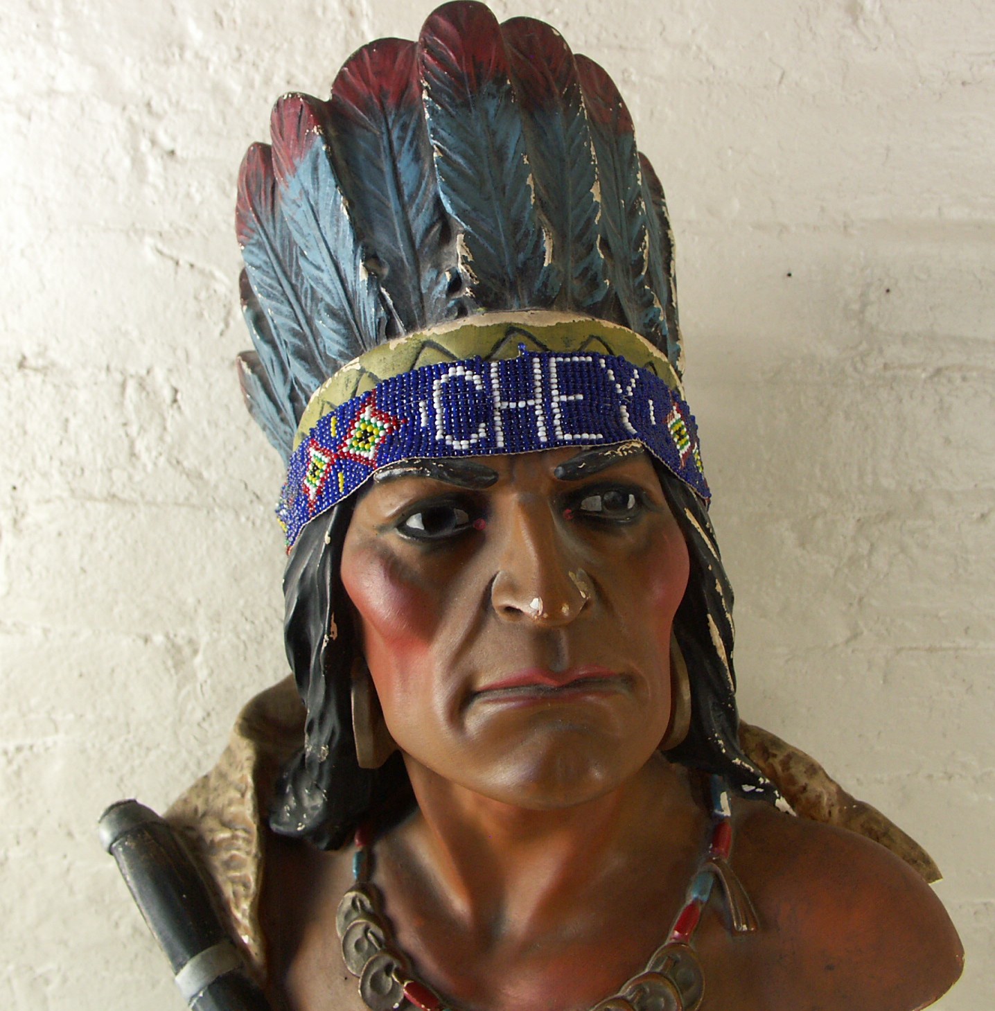 A Cigar Store Indian Bust, Souvenir Busts and Banks EBTH