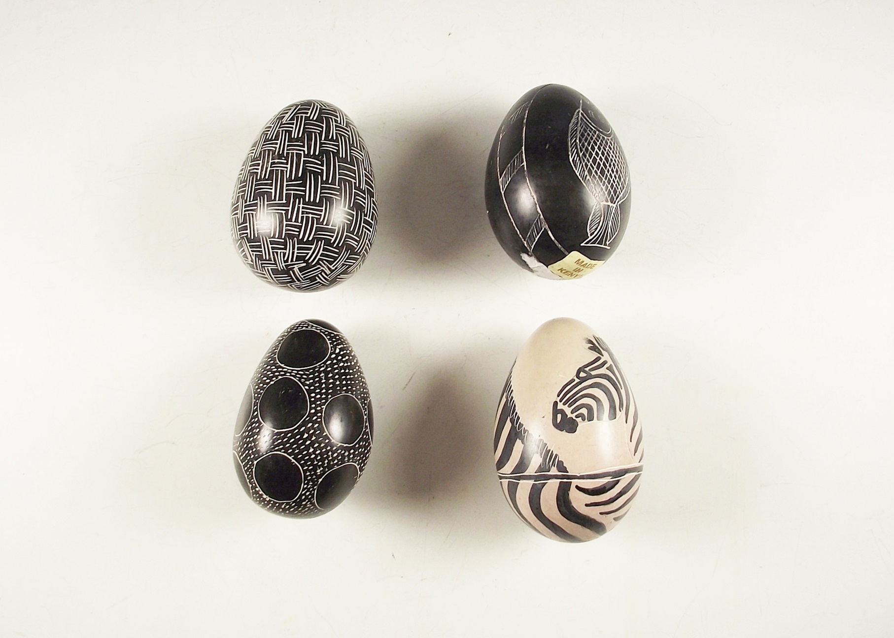 Group of Four Genuine Besmo Product Hand Carved Stone Eggs, Kenya EBTH