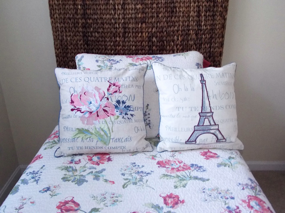 Pair of Pottery Barn Rattan Twin Beds Plus the Mattresses and Bedding