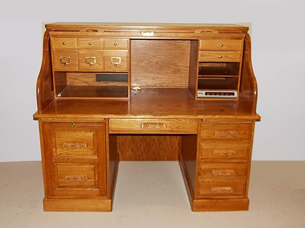 A Solid Oak Roll Top Computer Desk by "Winners Only Inc." EBTH