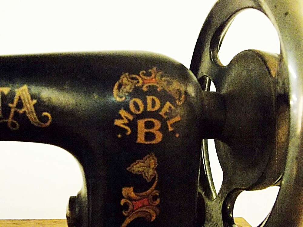 An Antique Minnesota Model B Treadle Sewing Machine In A Tiger Oak ...