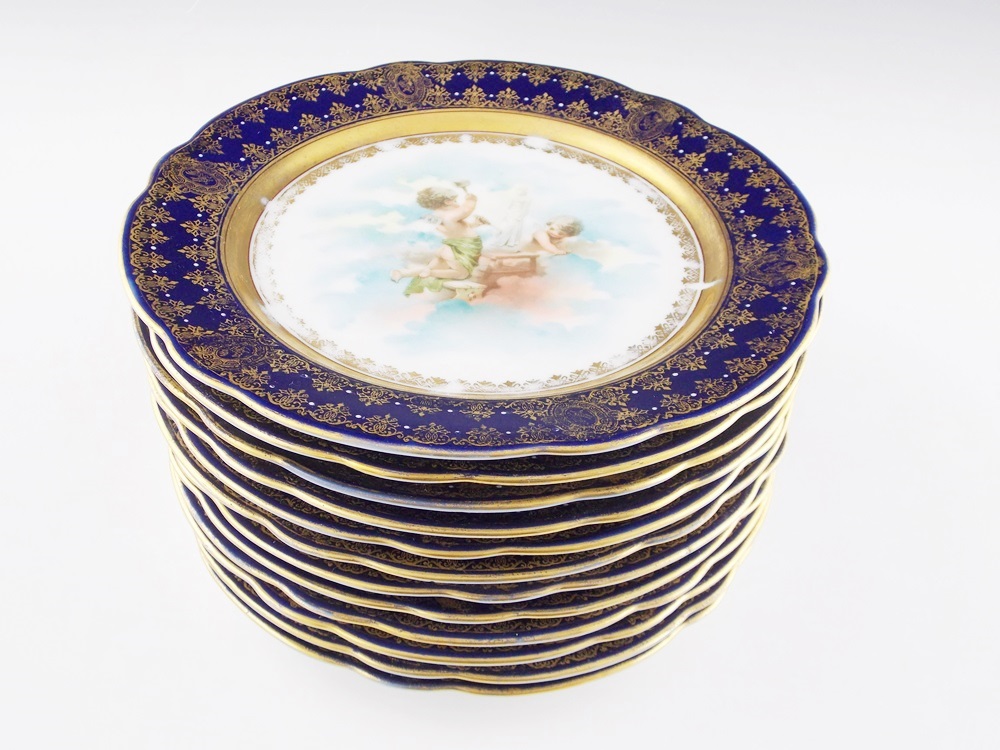 A Set of 12 Antique Ackermann & Fritze Porcelain Dessert Plates with