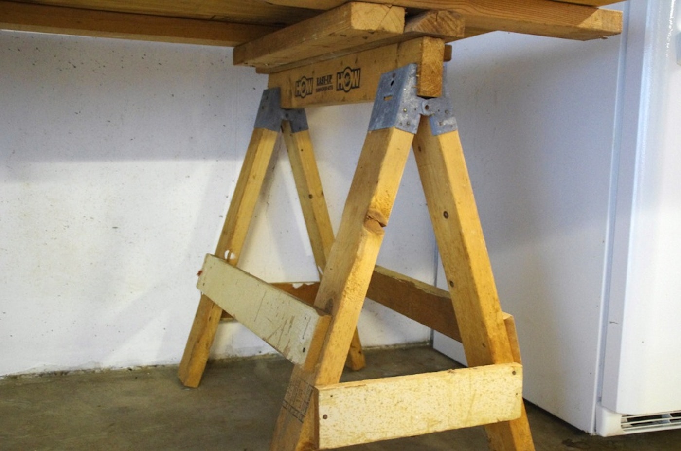 Portable Work Table with Plywood Top and Wooden Sawhorse base : EBTH