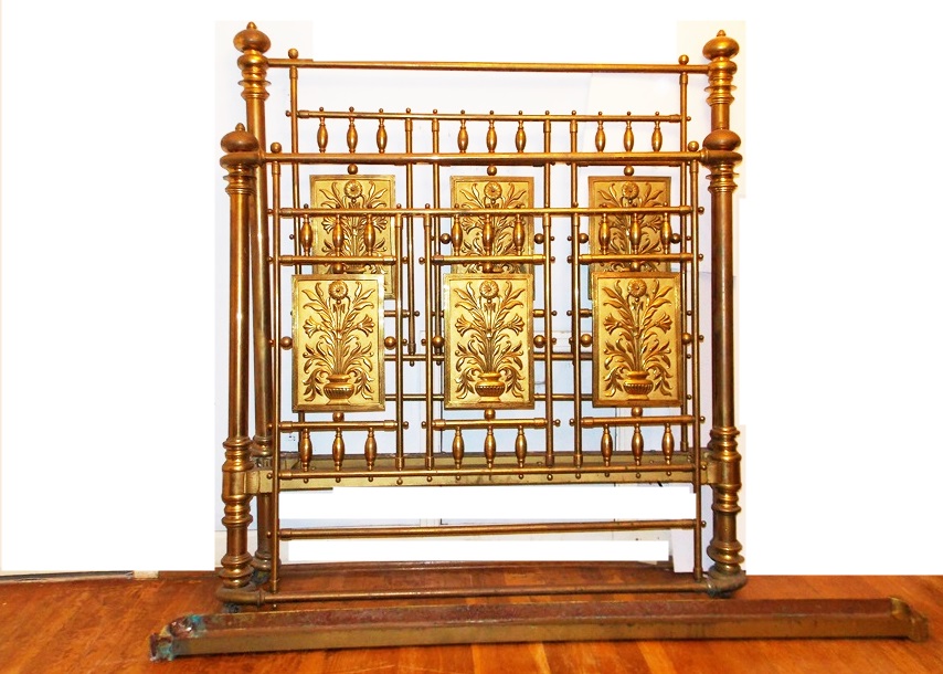 An Antique Brass Bed With Decorative Embossed Panels, Spindles and Finials EBTH