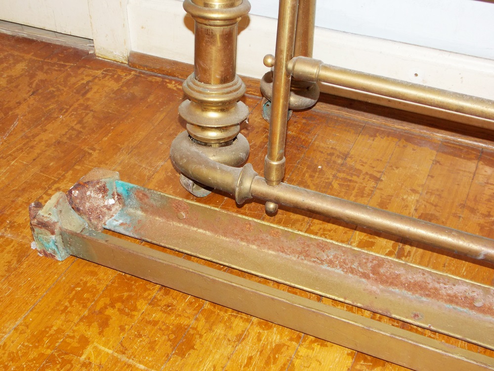 An Antique Brass Bed With Decorative Embossed Panels, Spindles and Finials EBTH