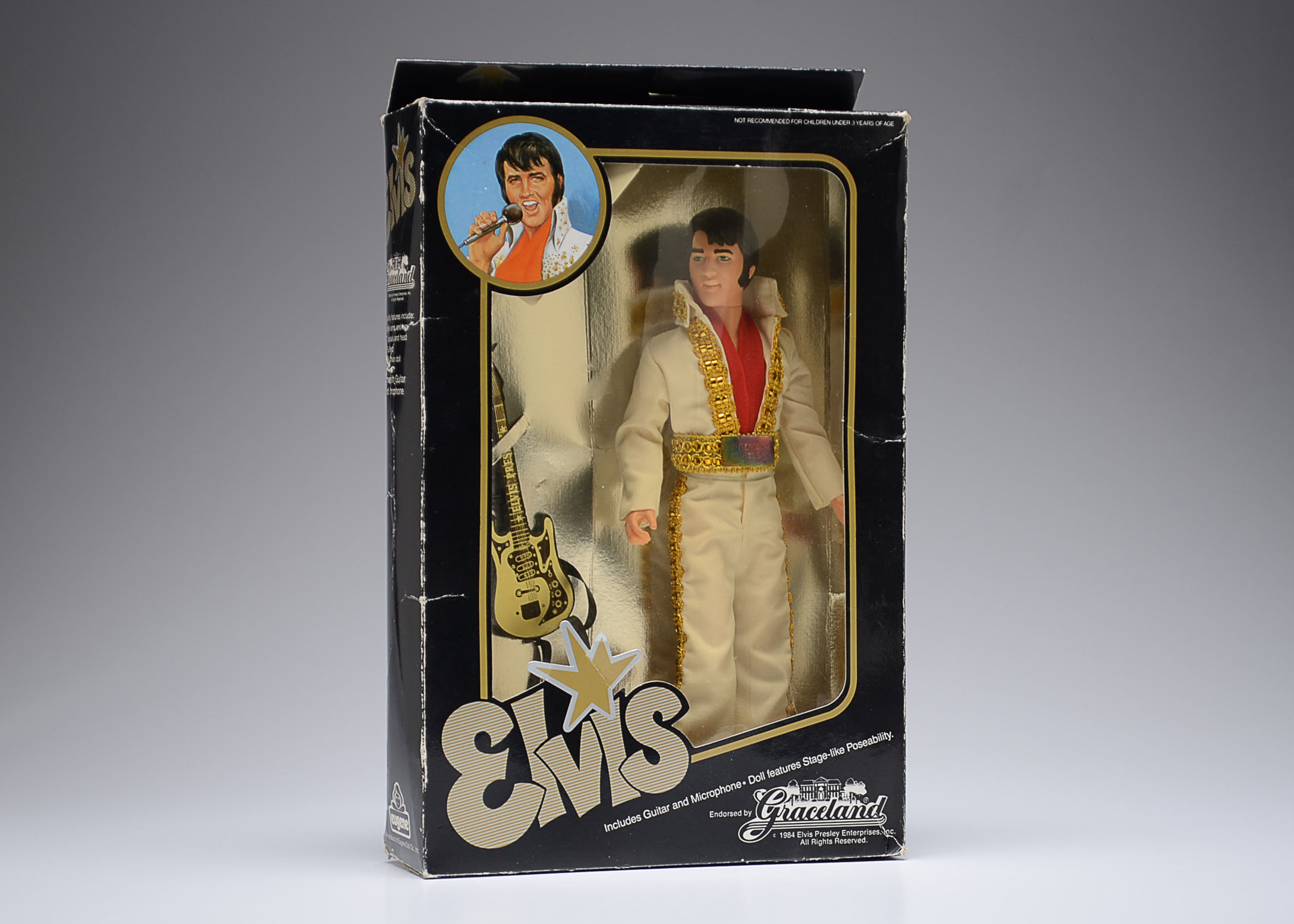 elvis doll in box