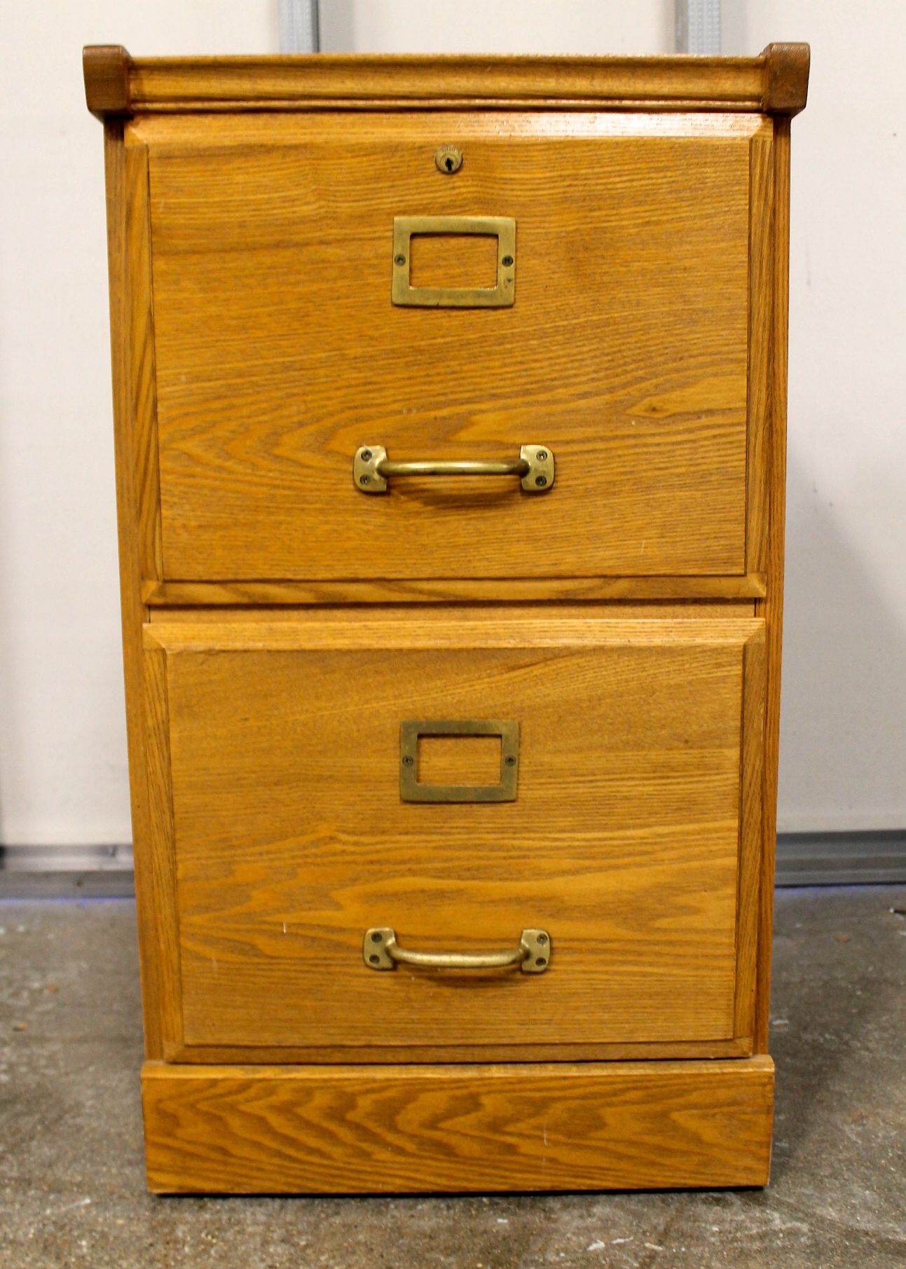 A Two Drawer Vertical Oak File Cabinet Ebth