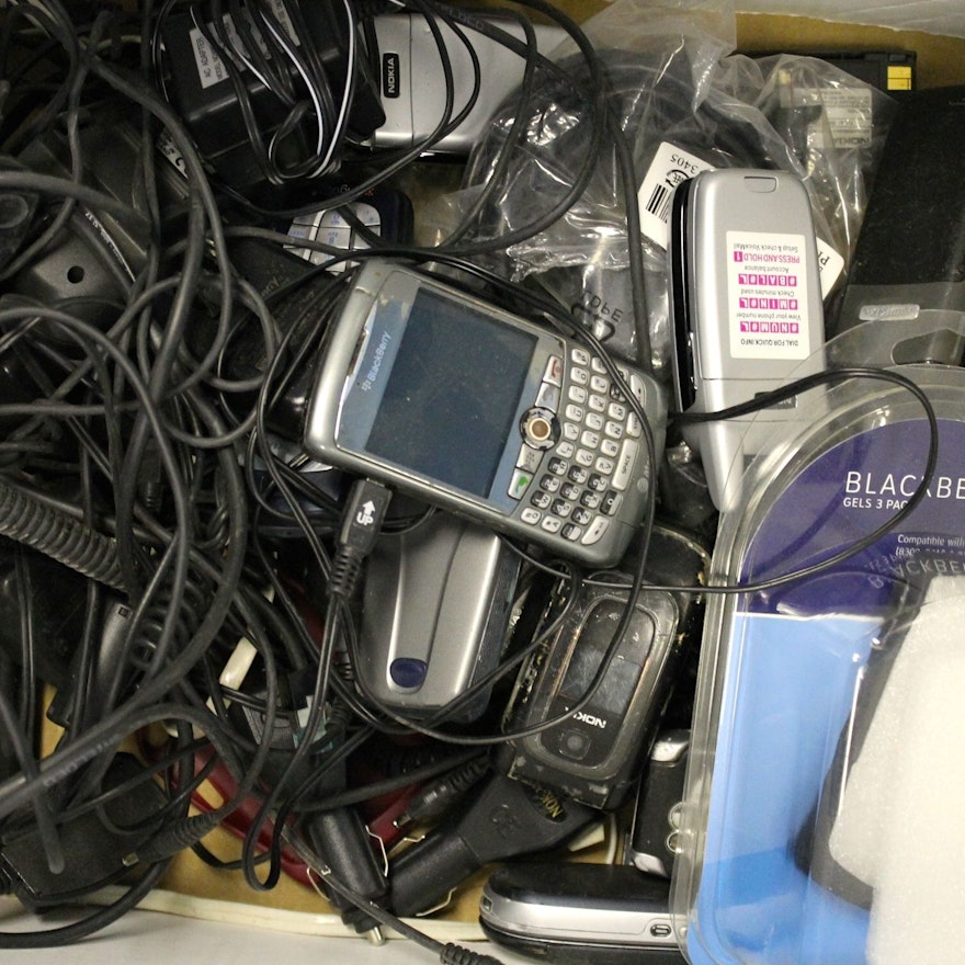 Lot of Cell Phones and Chargers