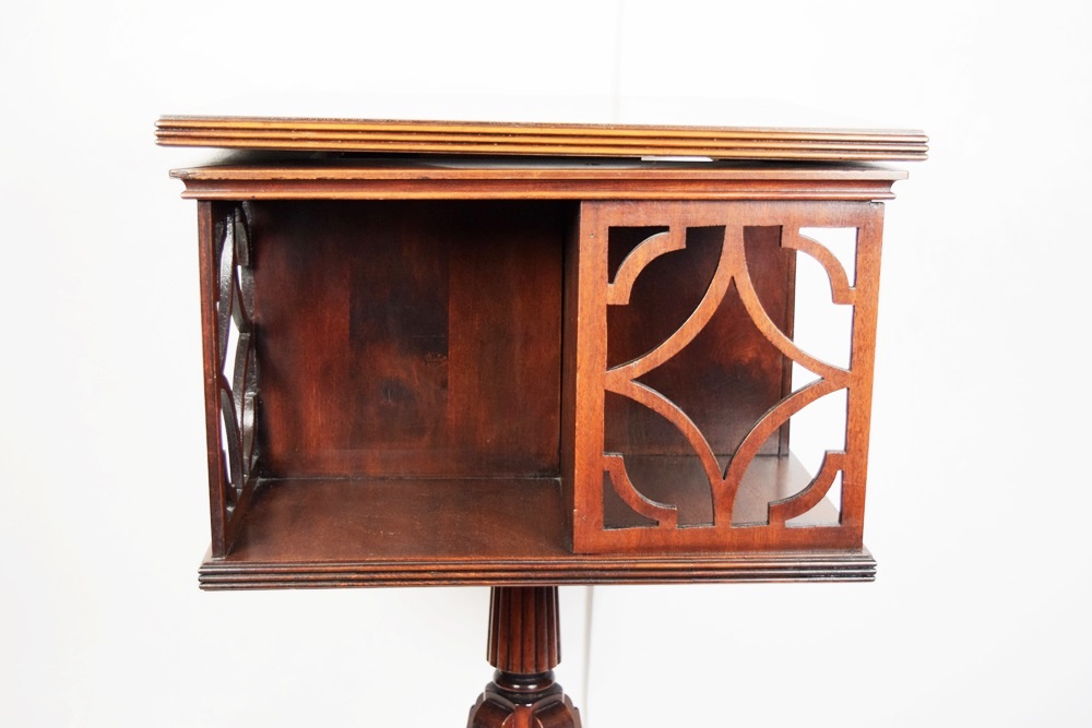 A Vintage Duncan Phyfe Style Rotating Book Table EBTH