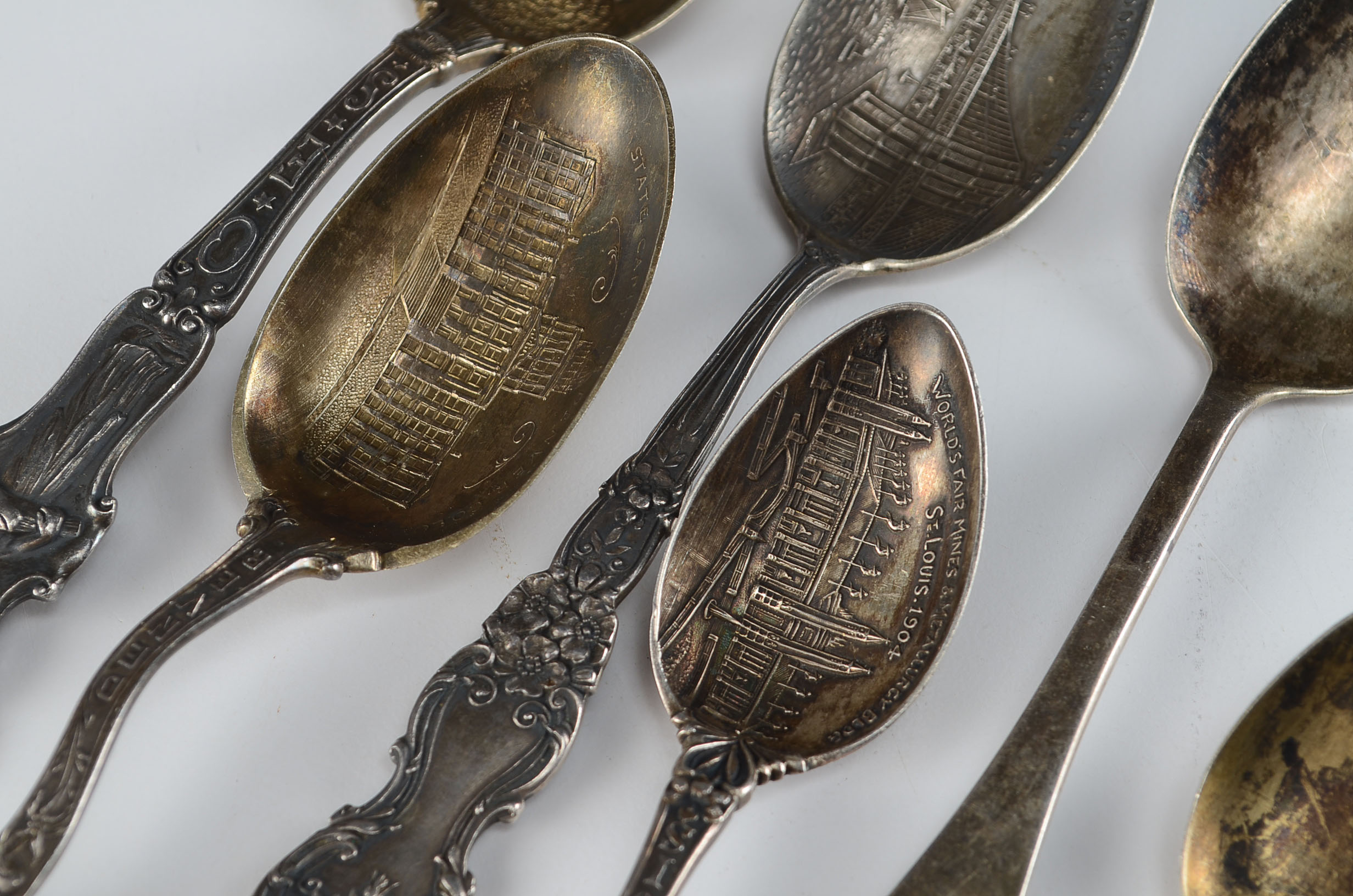 Nine Antique Sterling Silver Souvenir Spoons | EBTH