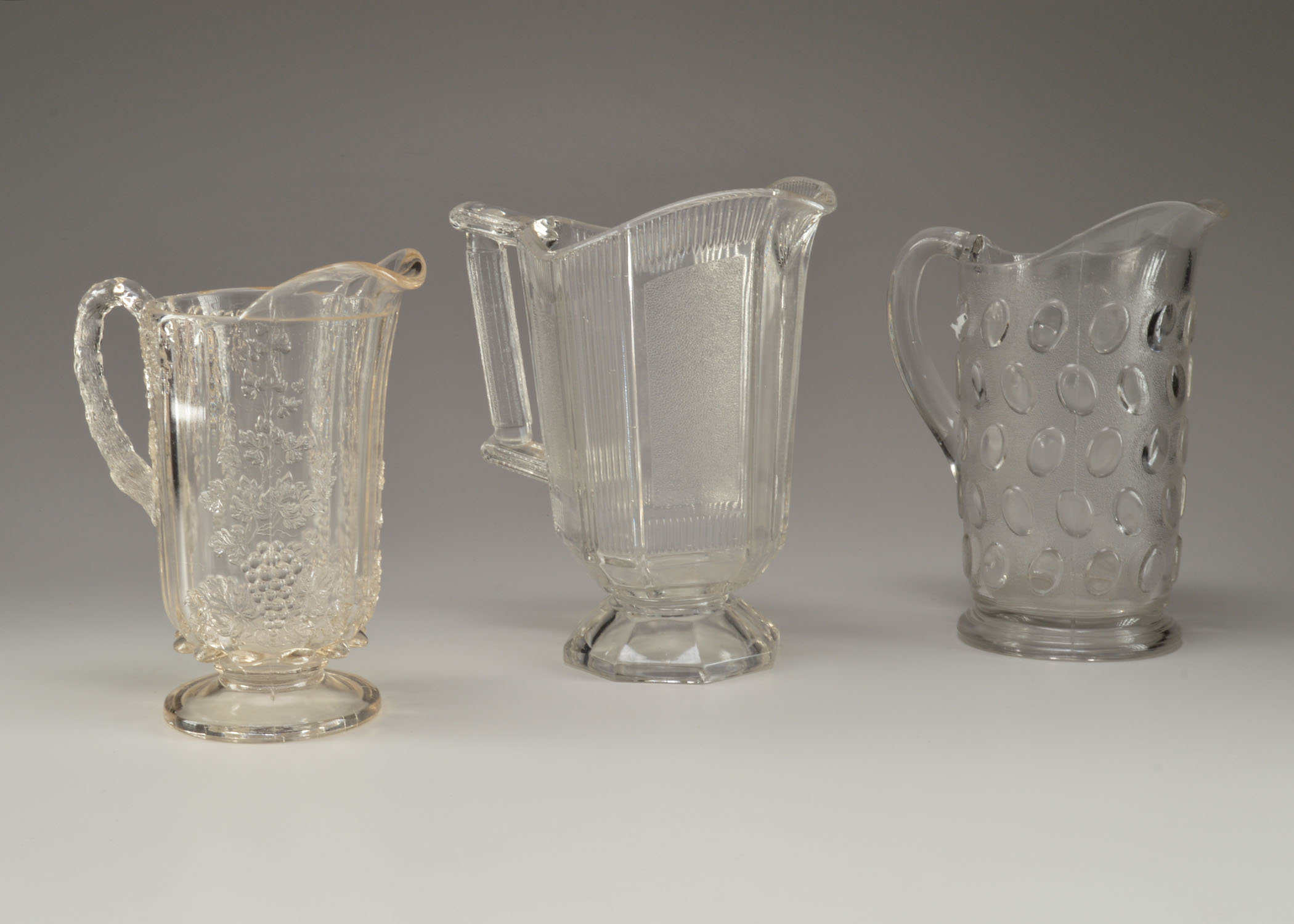 Trio Of Antique Glass Pitchers Ebth
