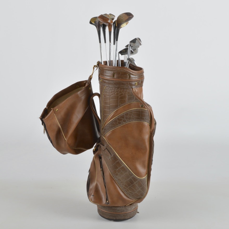 A Vintage Golf Bag With Clubs