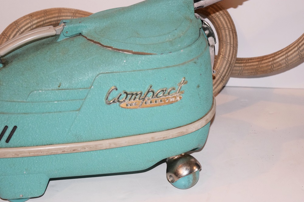 A Vintage 1940's Compact Electra Vacuum with Bags and Attachments EBTH