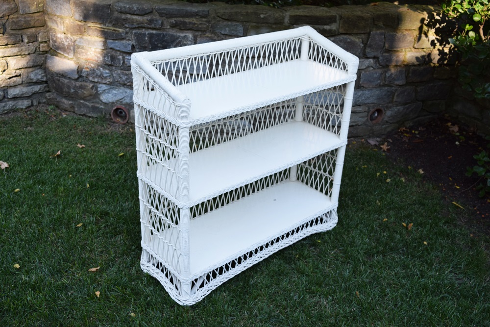 A Vintage White Wicker Bookcase EBTH