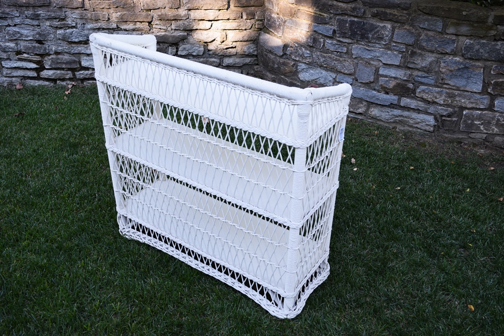 A Vintage White Wicker Bookcase EBTH