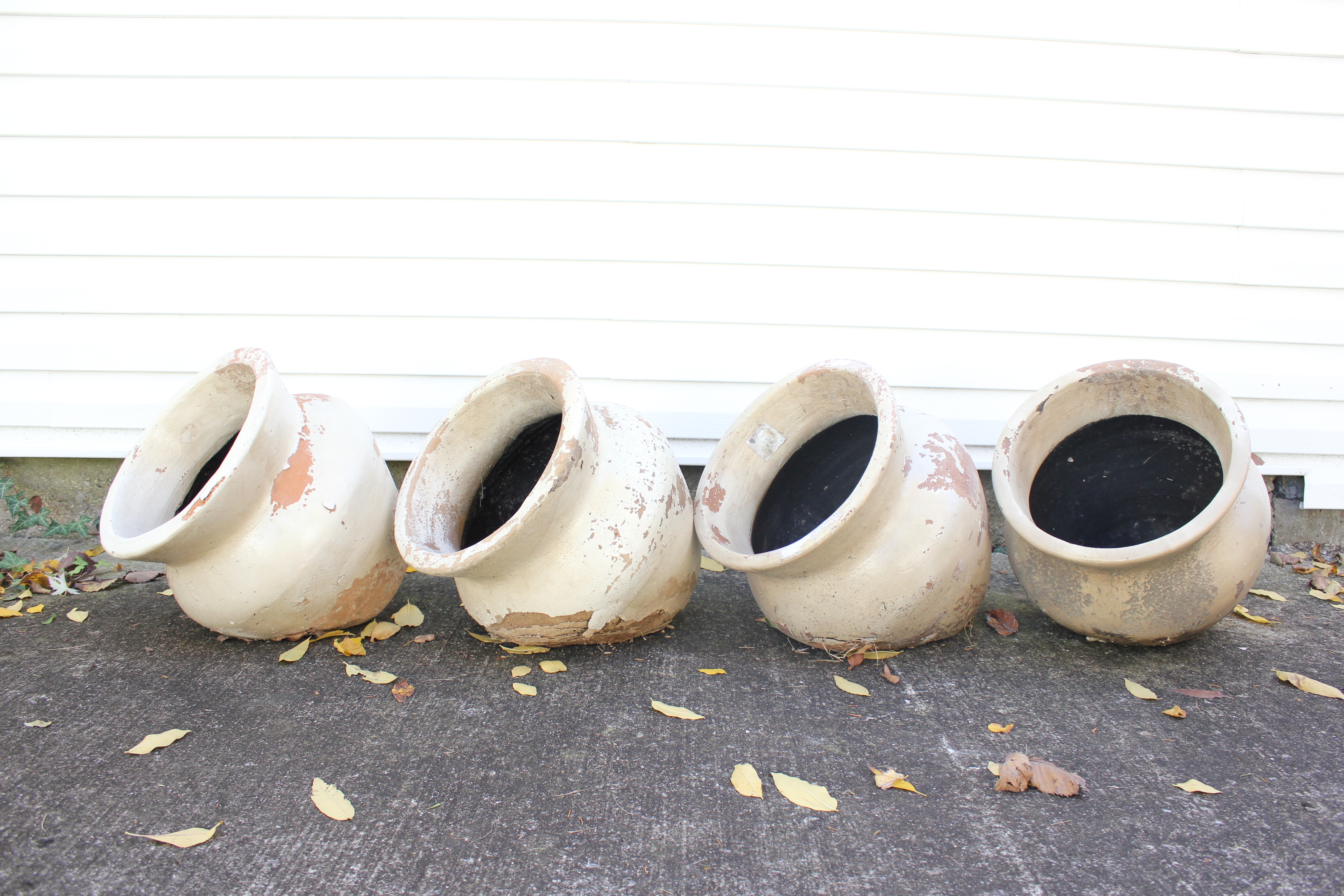 Set of Four Terra Cotta Tilting Planters EBTH
