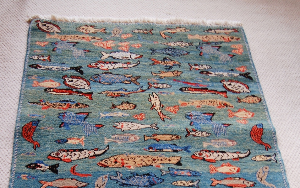 Woven Legends Fish Rug Featured in National Geographic Magazine | EBTH