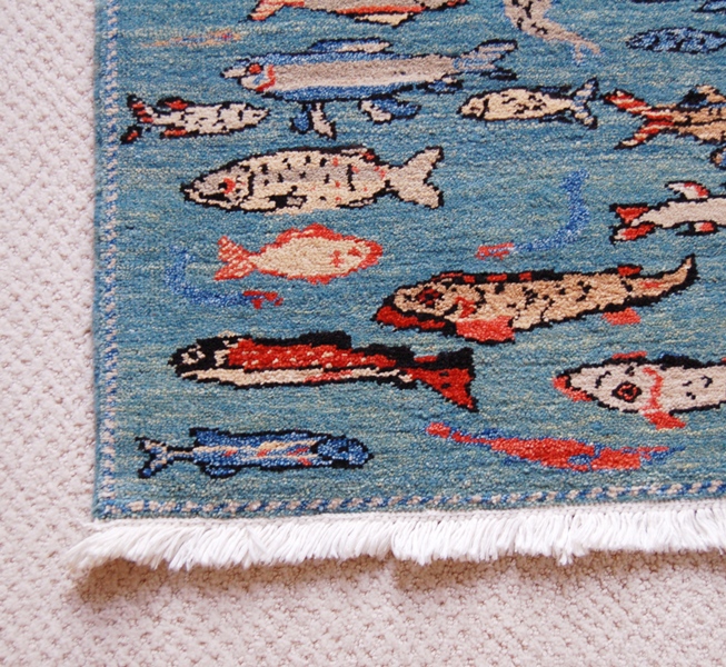 Woven Legends Fish Rug Featured in National Geographic Magazine | EBTH