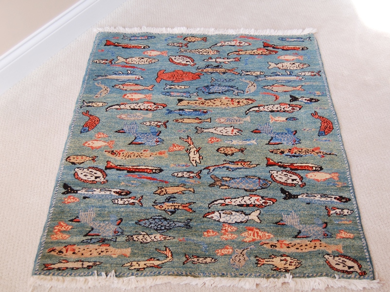 Woven Legends Fish Rug Featured in National Geographic Magazine | EBTH