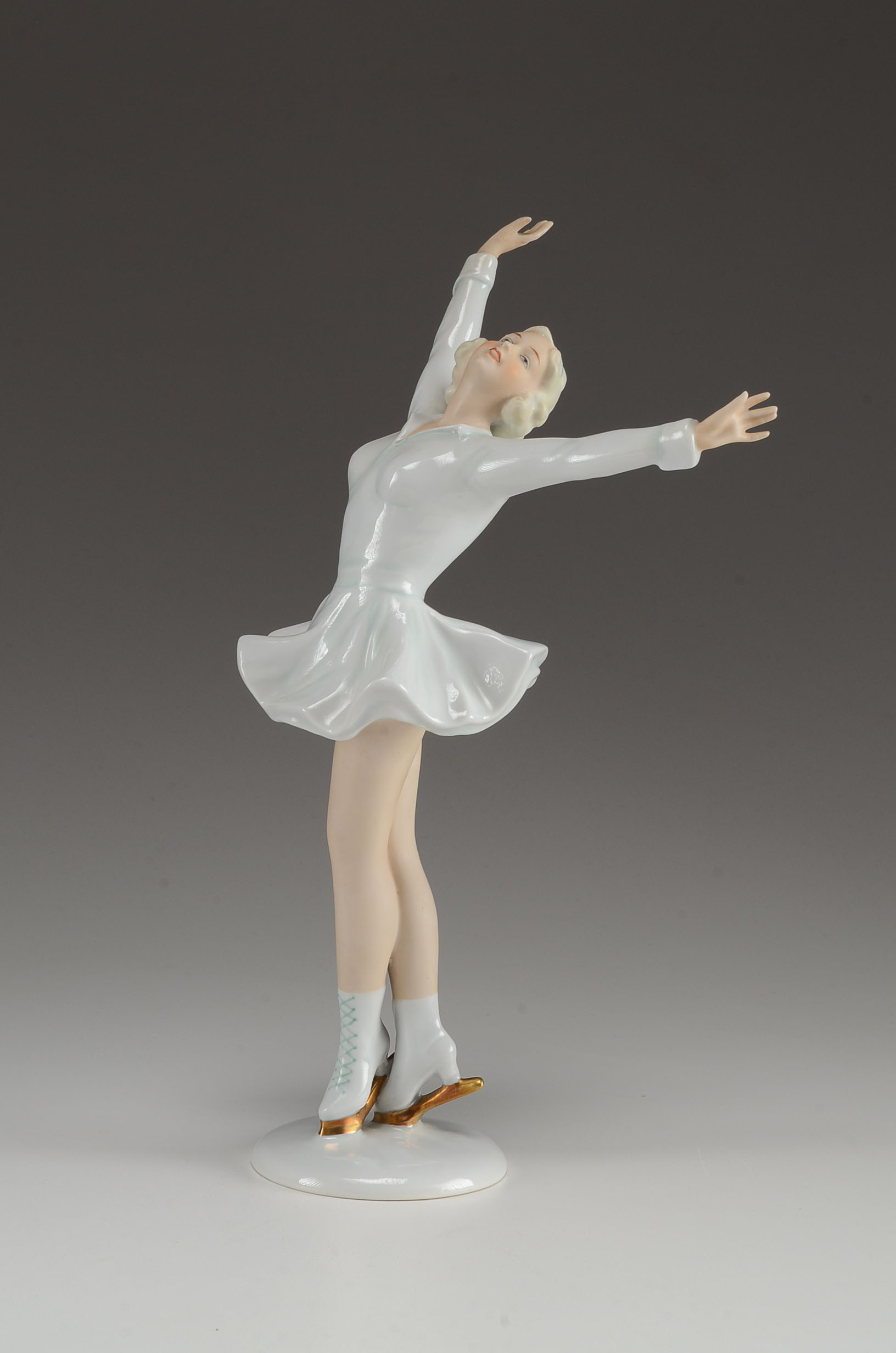 Two Porcelain Ice Skater Figurines EBTH