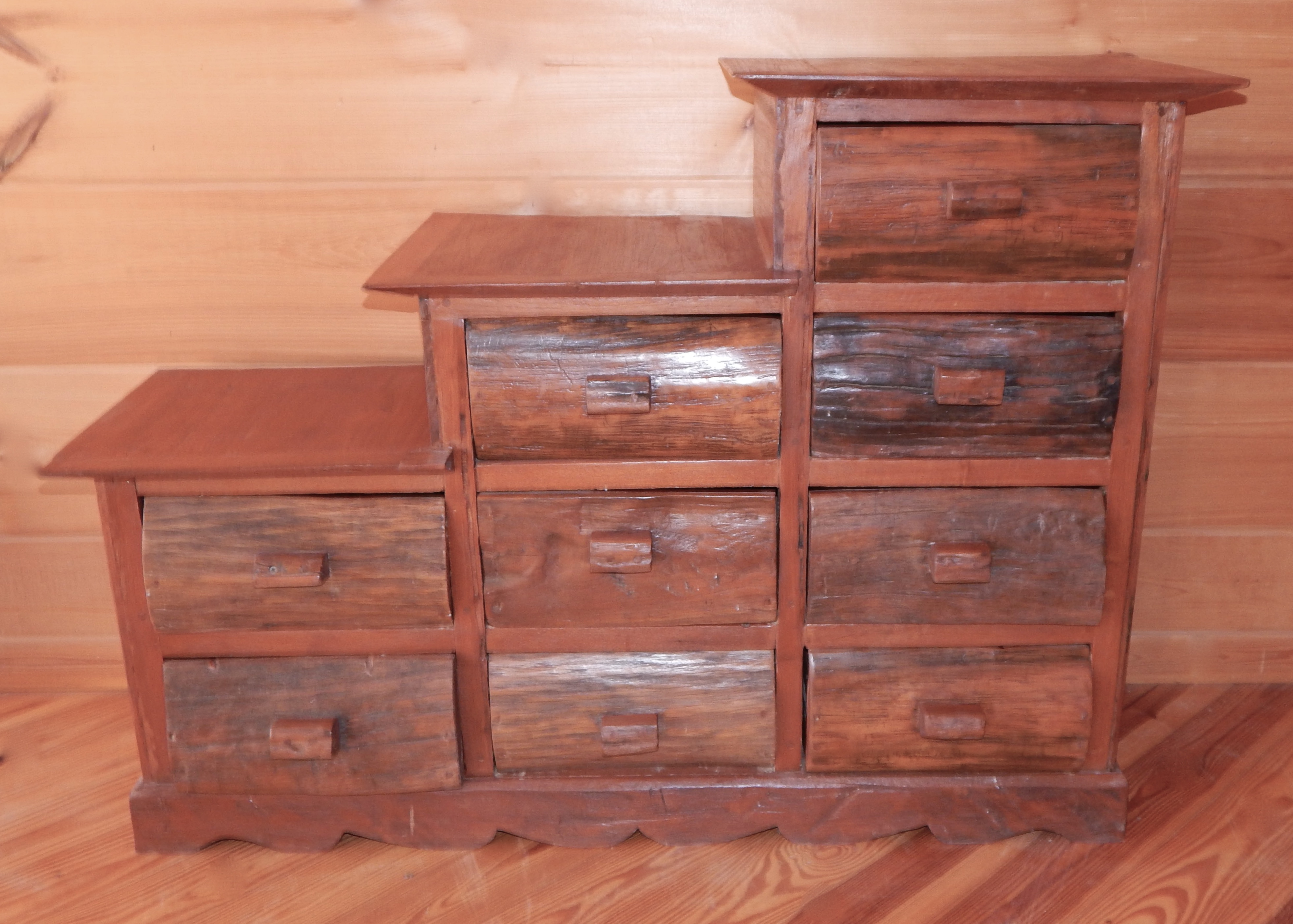 Tri Level Stair Step Chest Left Ebth