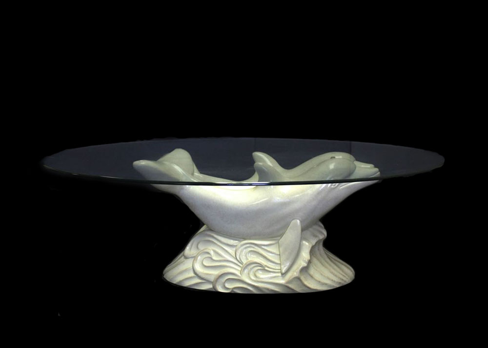 Glass Top Cocktail Table With Dolphin Base Ebth