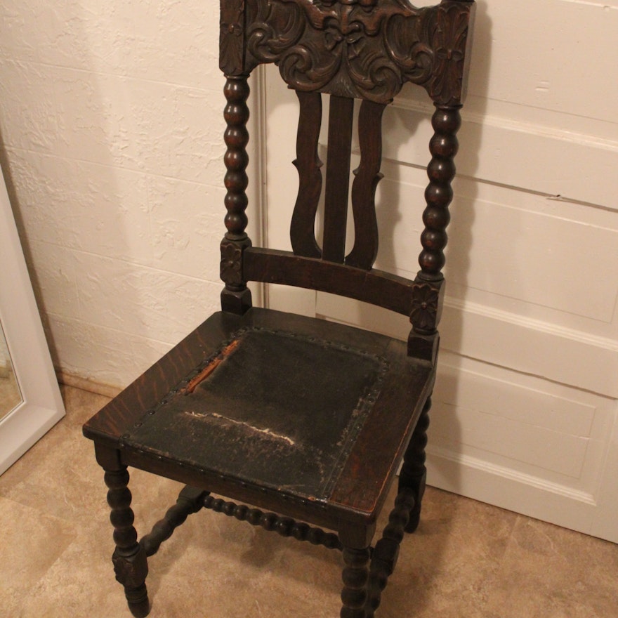 Antique Oak North Wind Face Chair Ebth