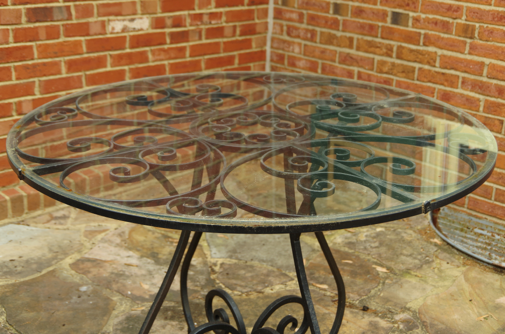 Black Wrought Iron Table with Glass Top and Scrolled Base EBTH