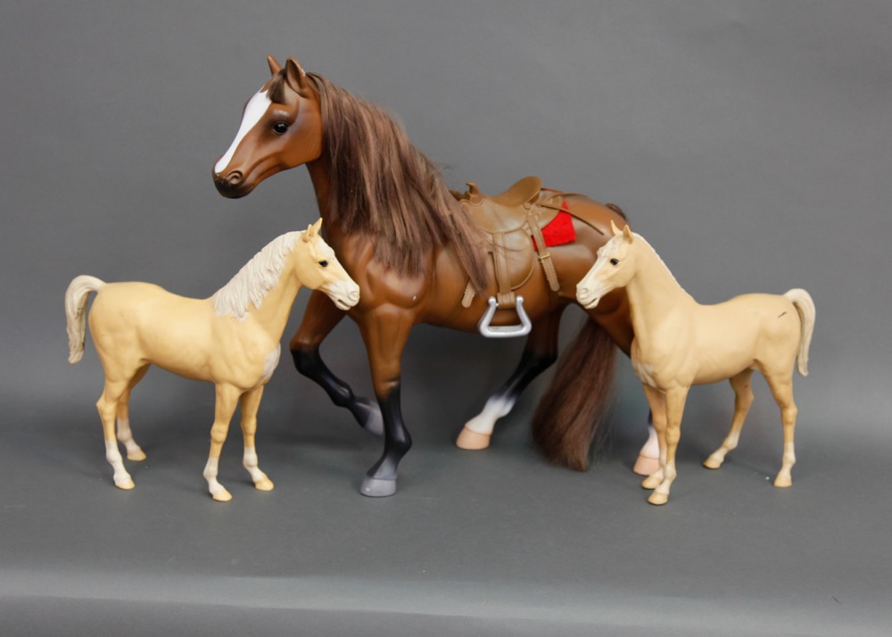 large plastic horses