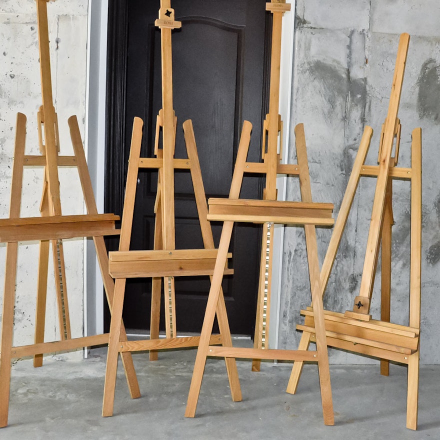 four large artist easels