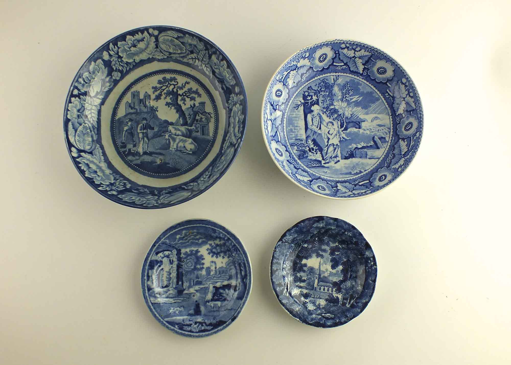 Four Antique Blue and White Printed Pottery Pieces EBTH