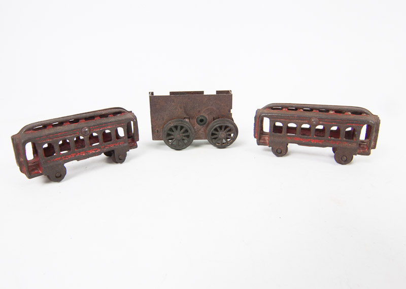 Three Antique Cast Iron Toy Train Cars Ebth