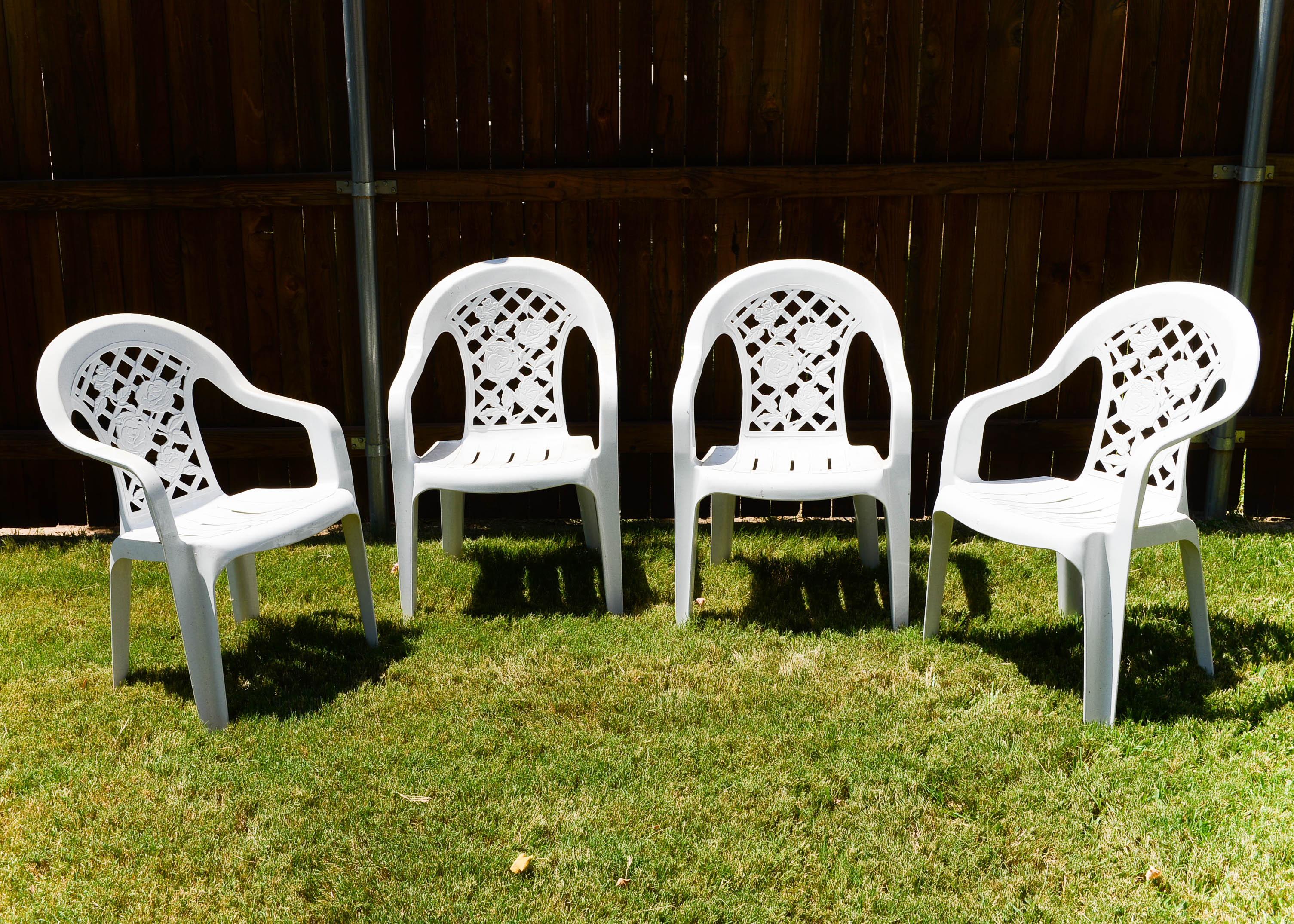 Four Plastic Outdoor Chairs EBTH