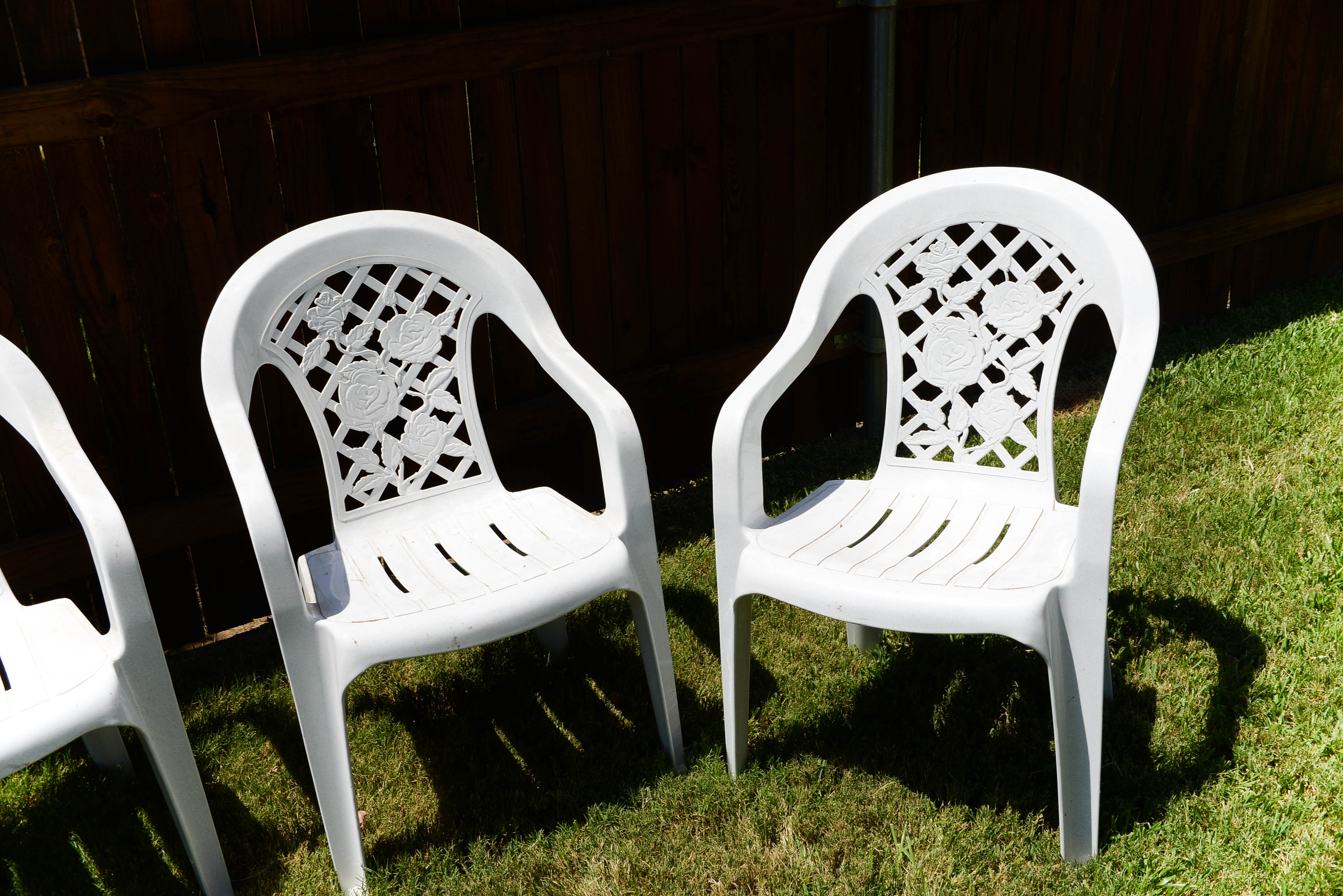 Four Plastic Outdoor Chairs EBTH