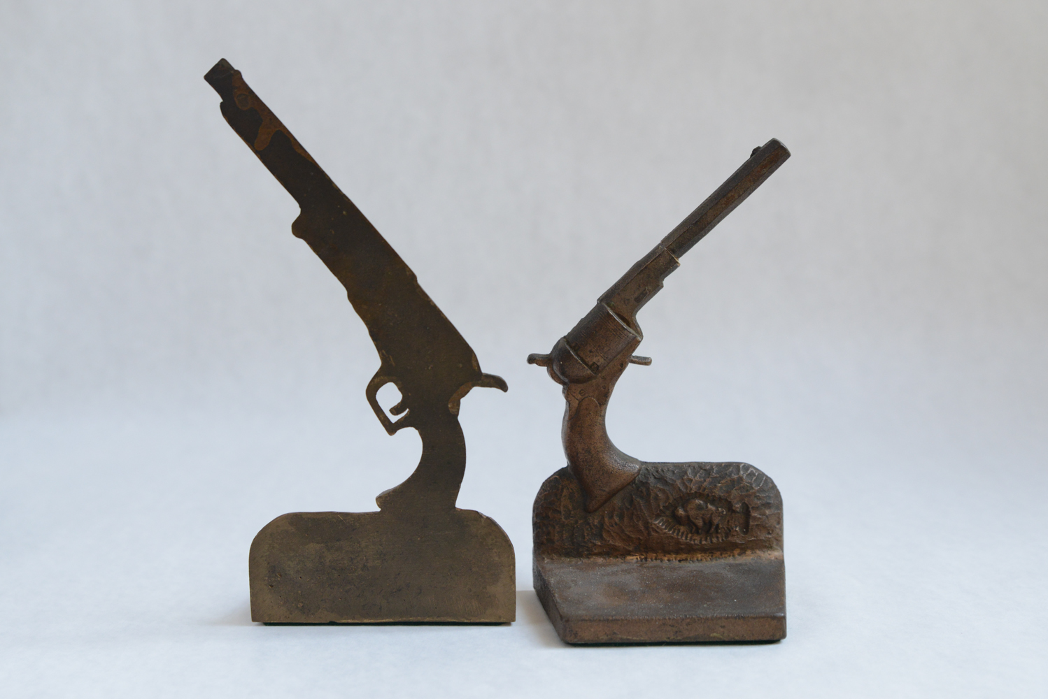 Pair of Vintage Cast Metal Pistol Bookends EBTH