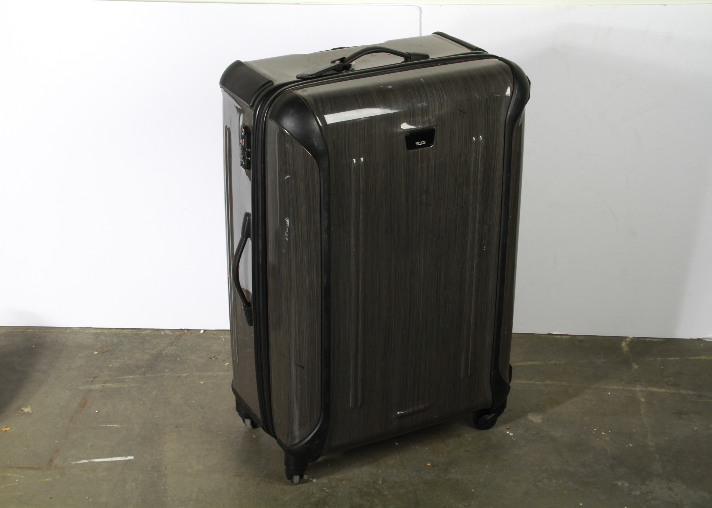 tumi hard shell luggage