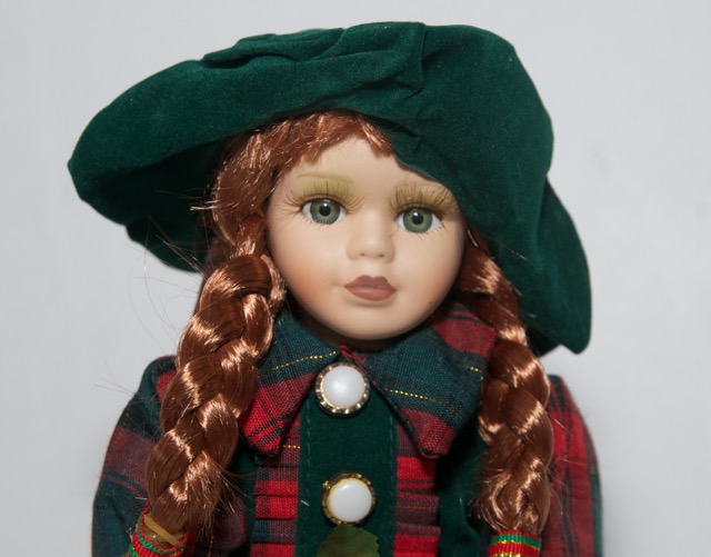 Collectible Porcelain Doll in Green Dress EBTH