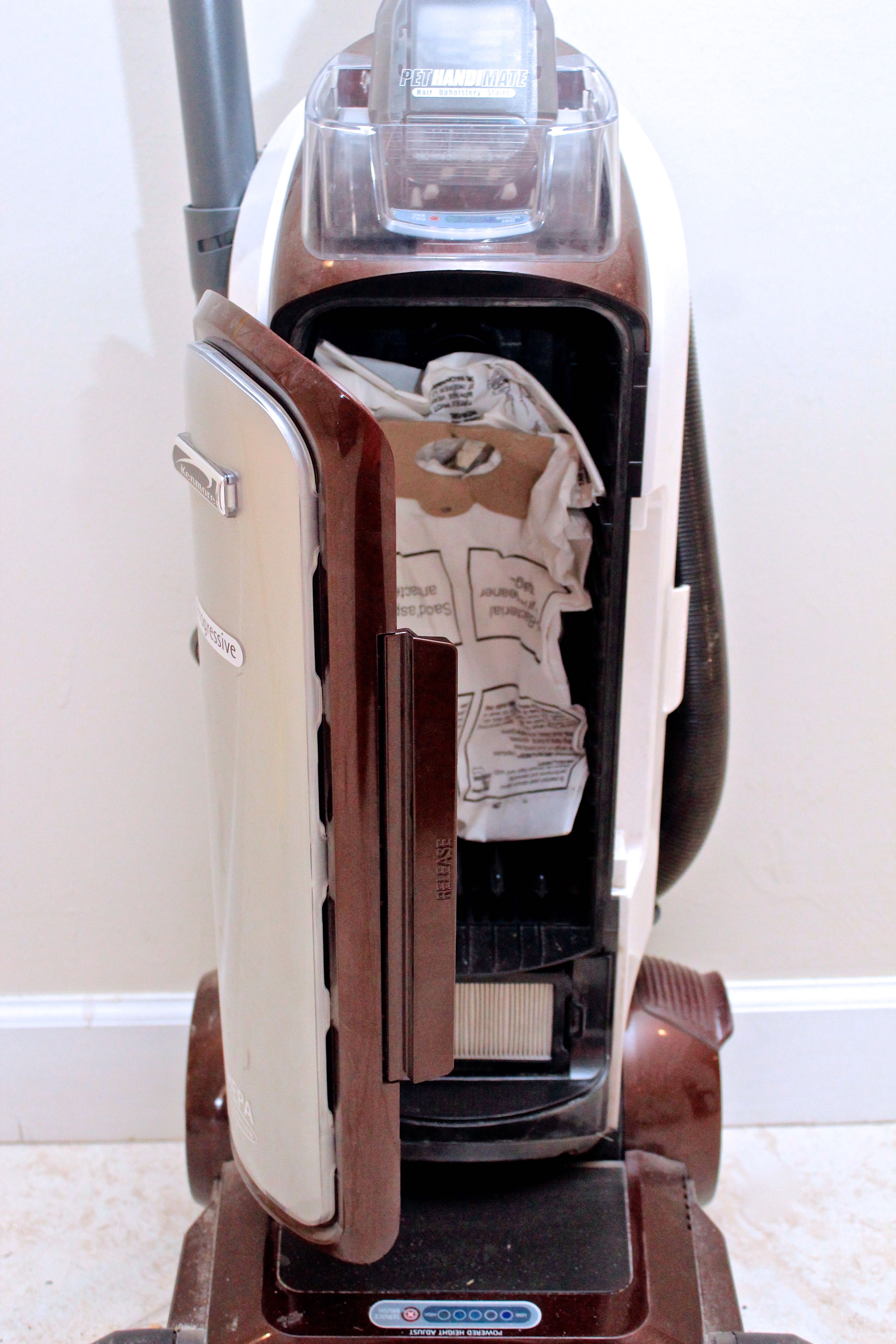 Kenmore Upright Progressive Vacuum and Assorted Brooms EBTH