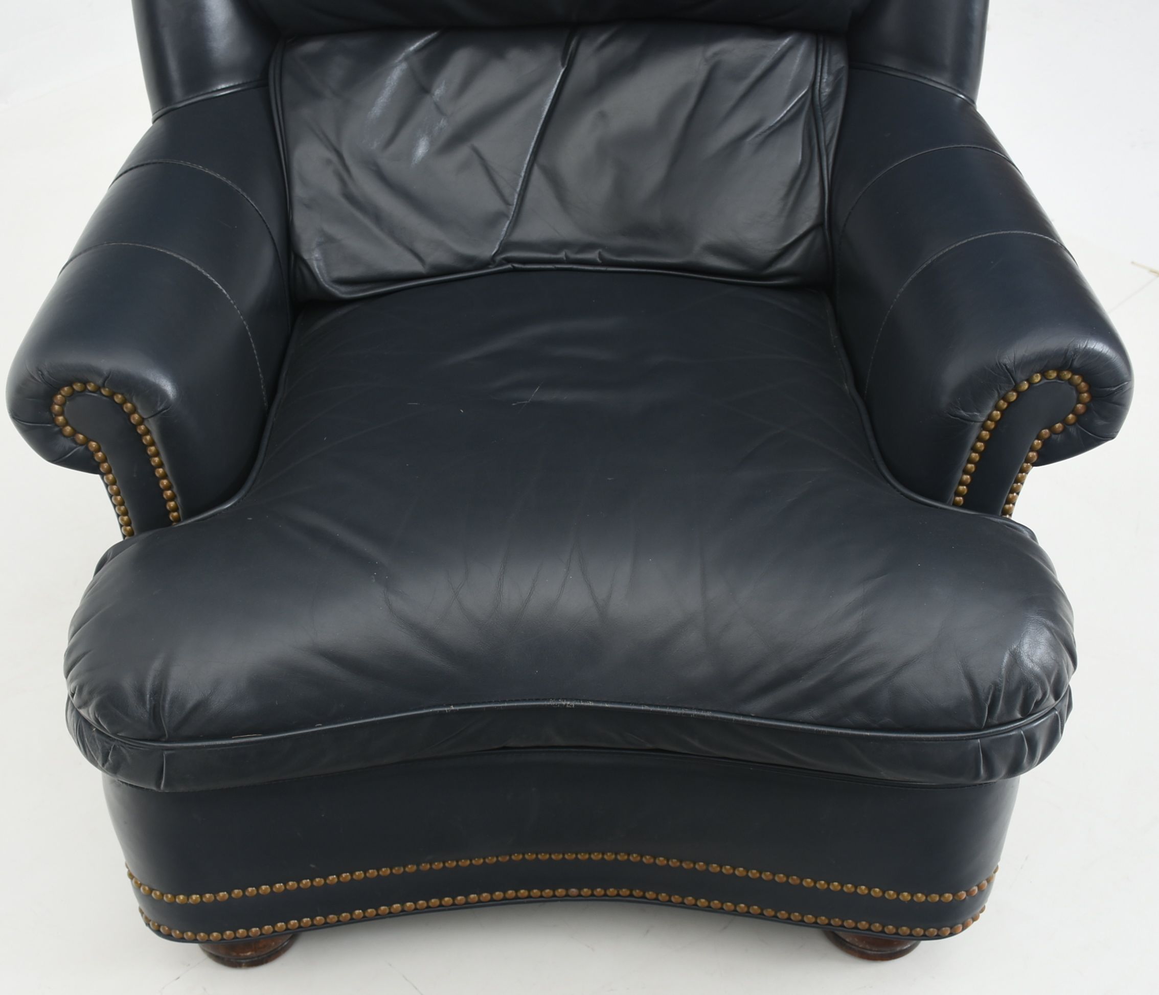 Hancock and Moore Leather Arm Chair and Matching Ottoman EBTH