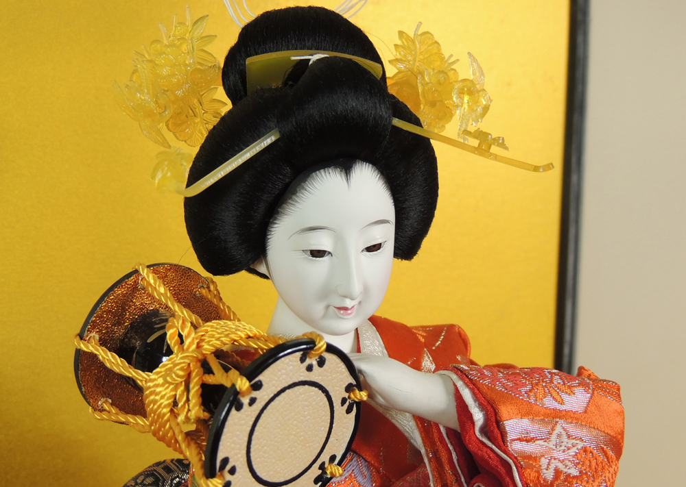porcelain geisha doll
