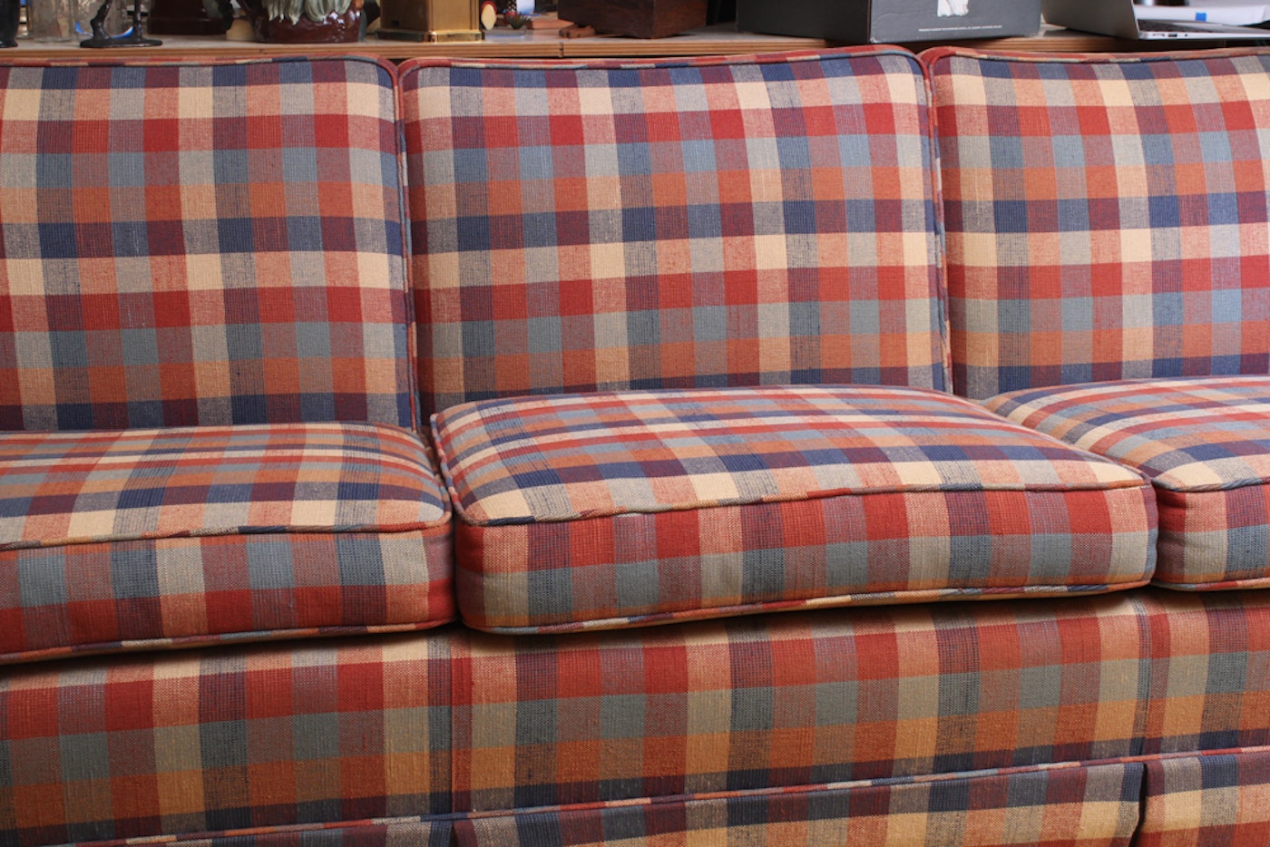 plaid faux leather and wood sofa