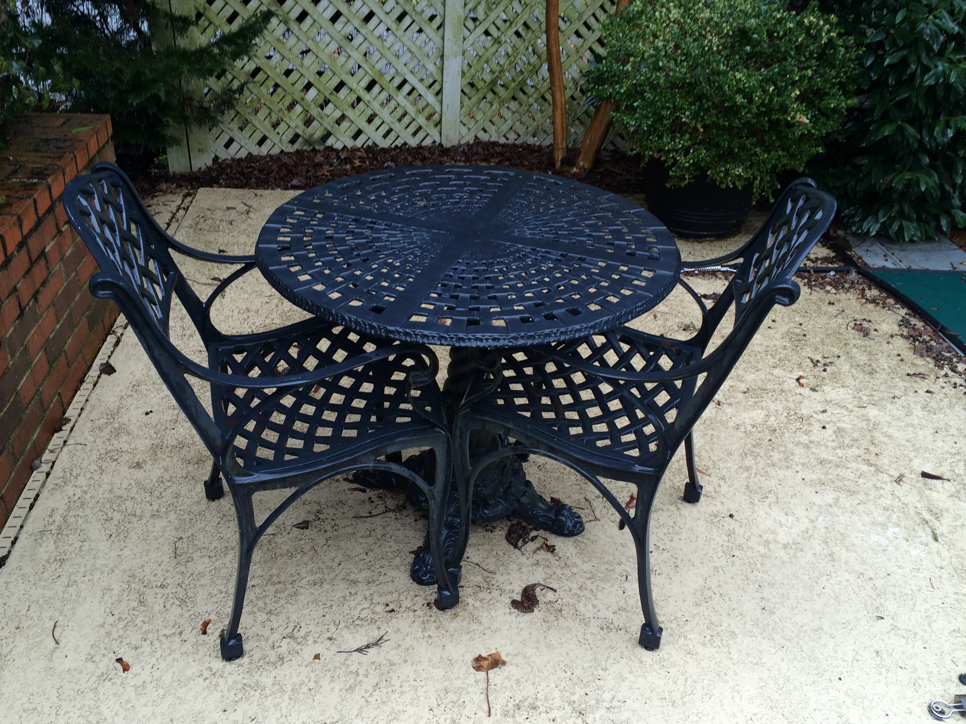 Cast Iron Bistro Table and Chairs EBTH