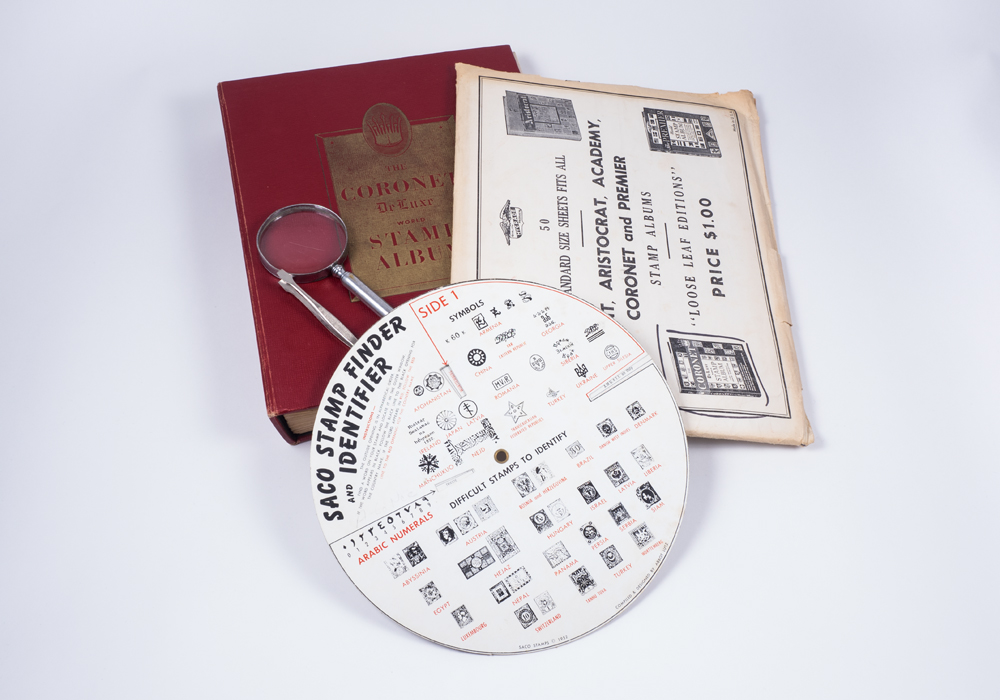 The Deluxe World Stamp Album and Stamp Collector Accessories EBTH