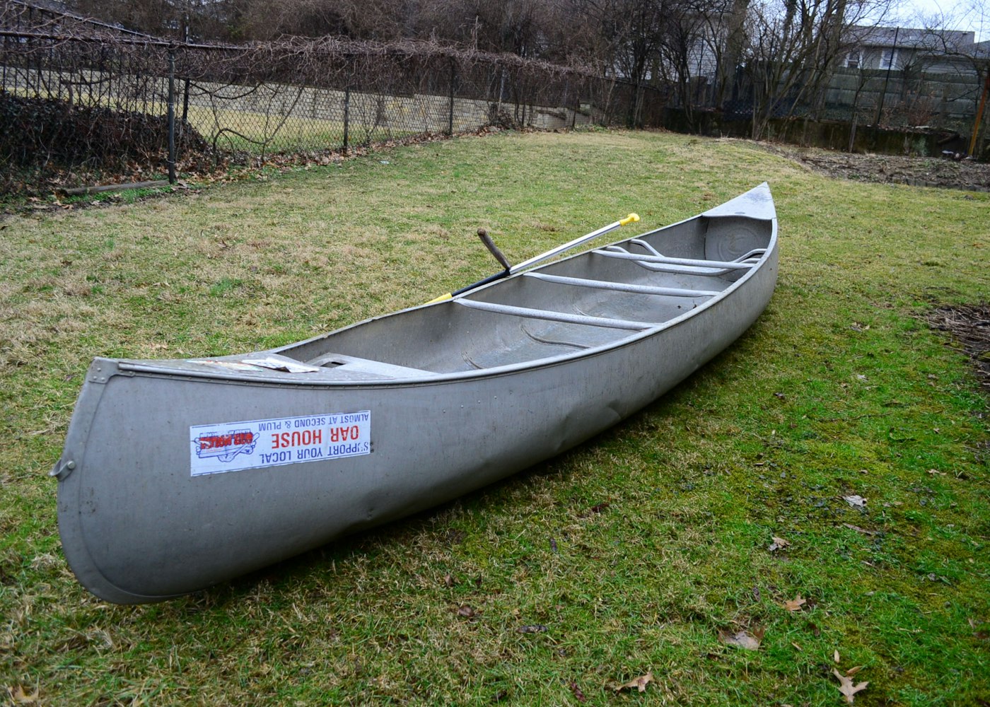 grumman aluminum canoe with oar and pizza paddle : ebth