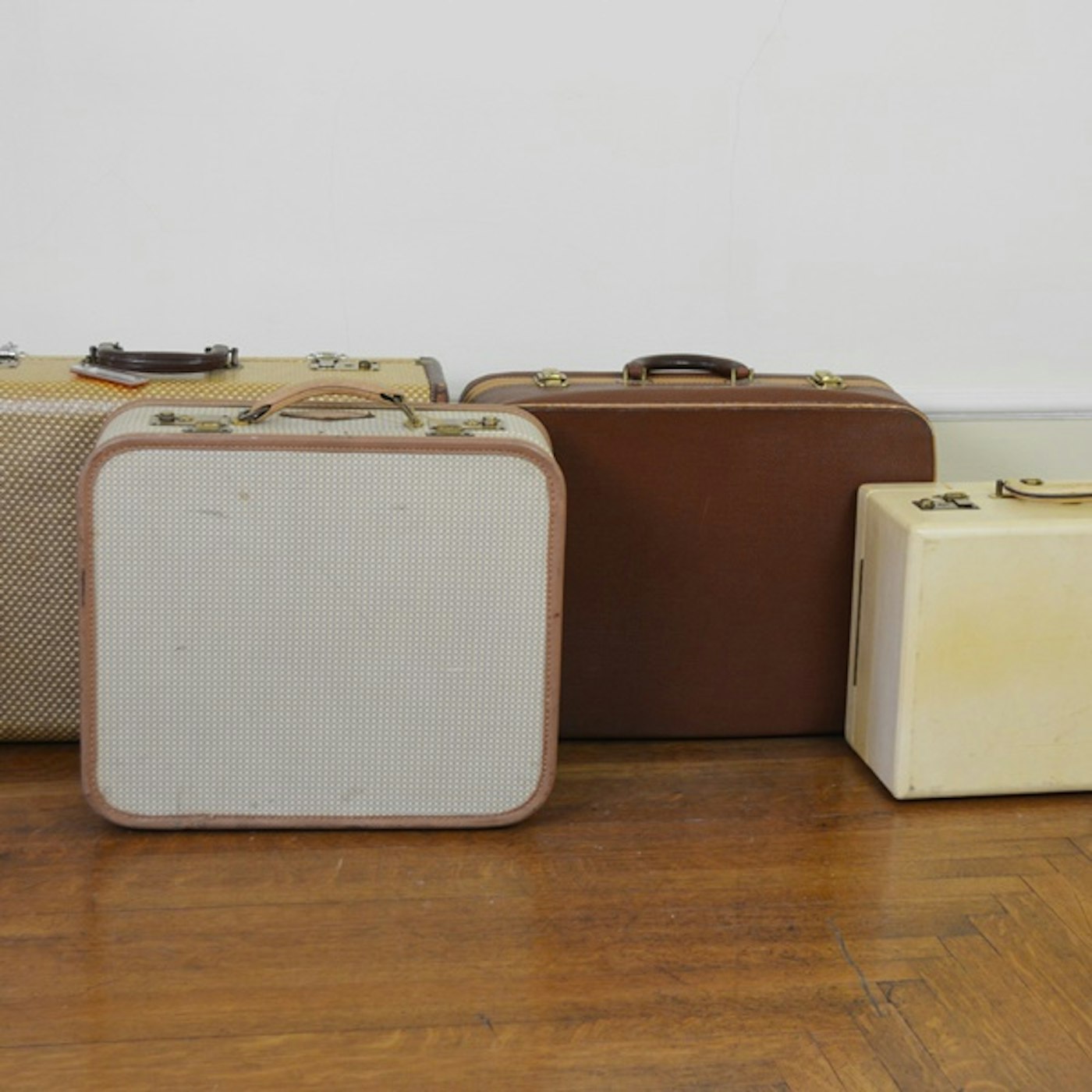 Download Four Pieces of Vintage Luggage Including a Leather ...