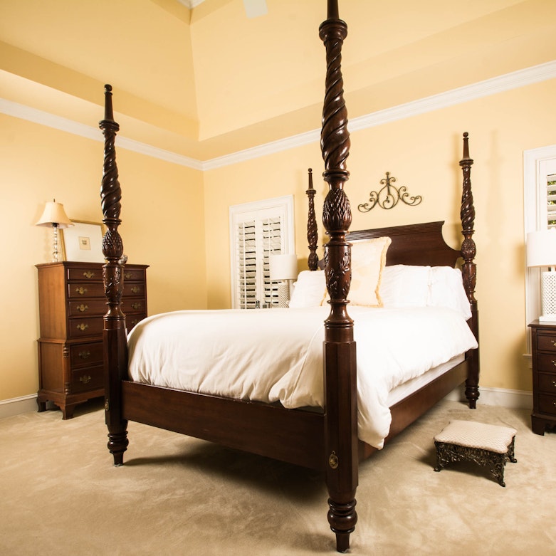 stained mahogany carved four poster bed
